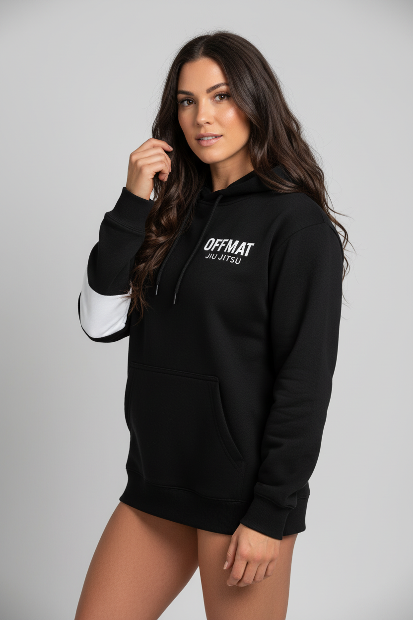 Woman wearing a black hoodie with 'OFFMAT' logo on a gray background