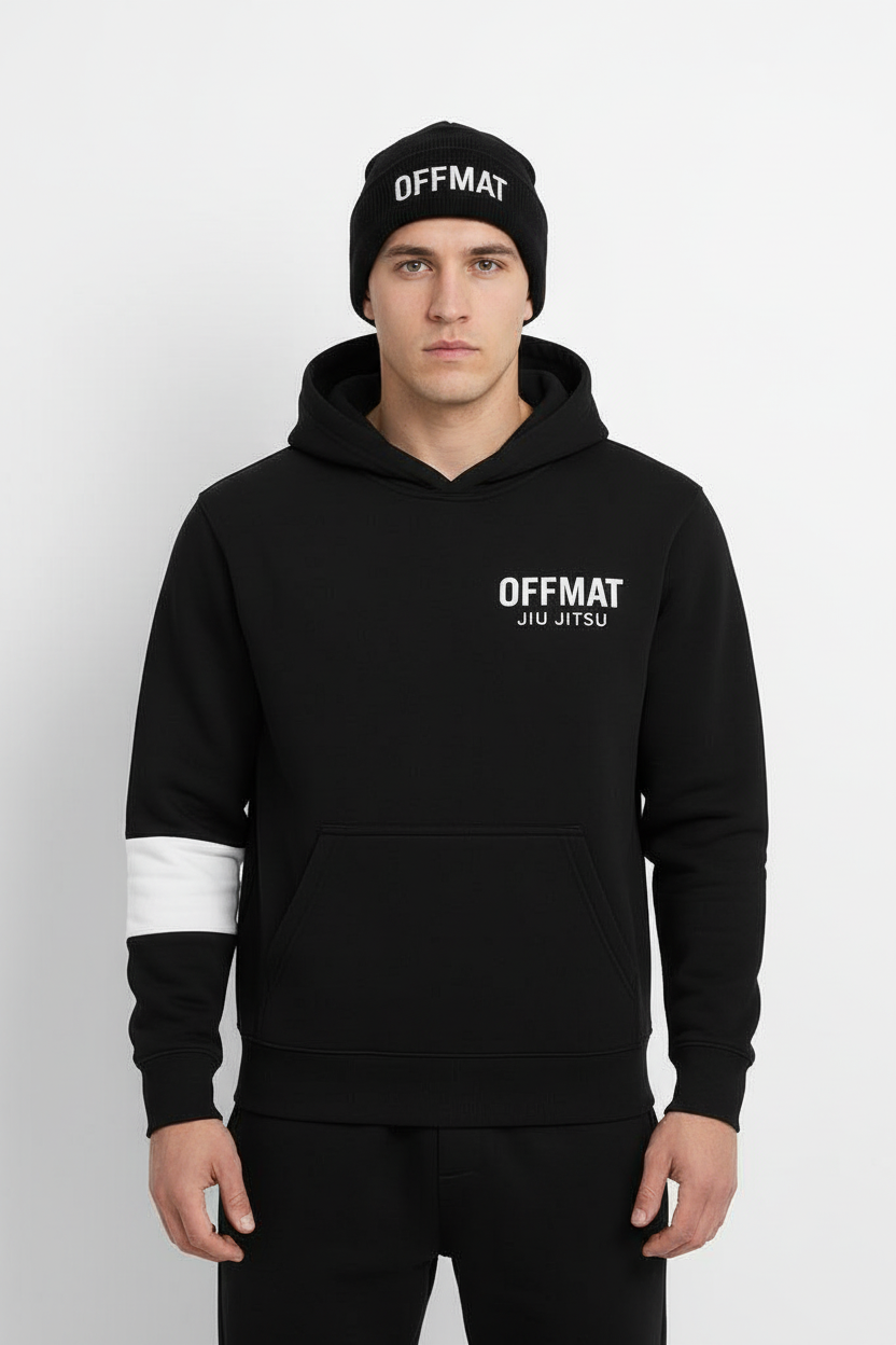 Person wearing a black hoodie and beanie with 'OFFMAT' branding on a white background