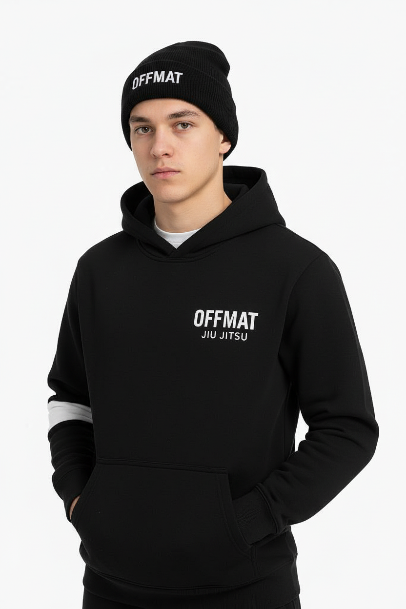 Person wearing a black hoodie and beanie with 'OFFMAT' branding on a white background