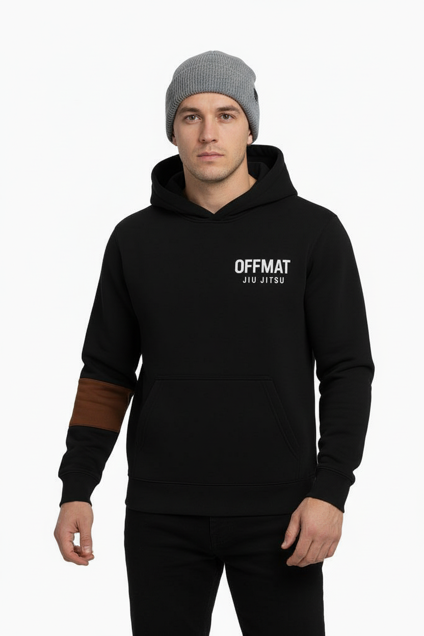Person wearing a black hoodie with 'OFFMAT' logo on a white background